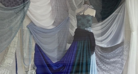A picture containing person, curtain, indoor, person
Description automatically generated