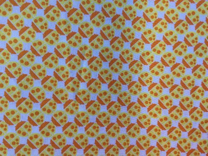 A fabric surface
Description automatically generated